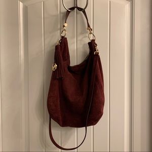 Michael Kors burgundy suede bag.